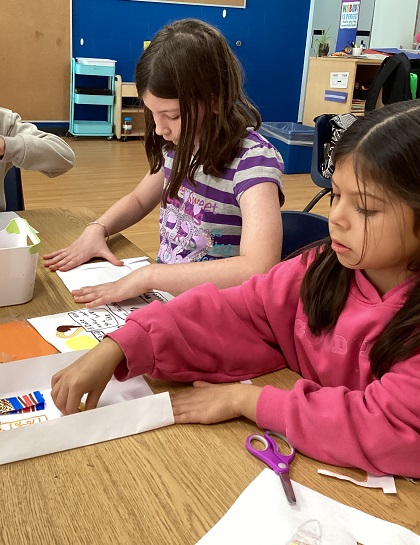School age children working on their truth and reconciliation learning