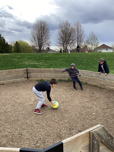 School-age children playing gagaball
