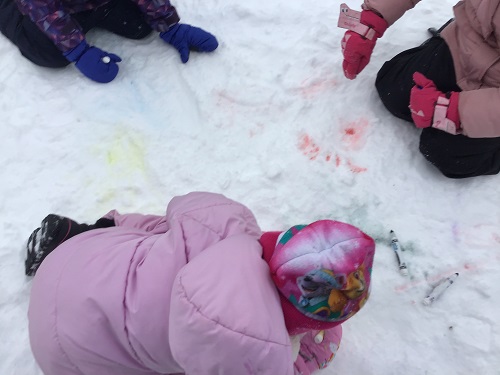 JKK children colouring snow with markers