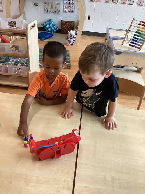 Two children engaged in a game together.