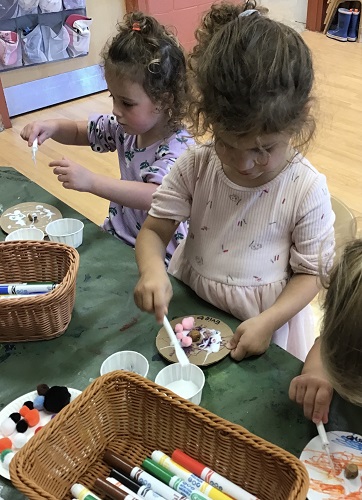 Children crafting at a table