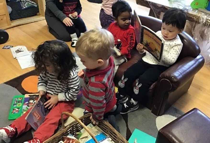 groups of children reading books