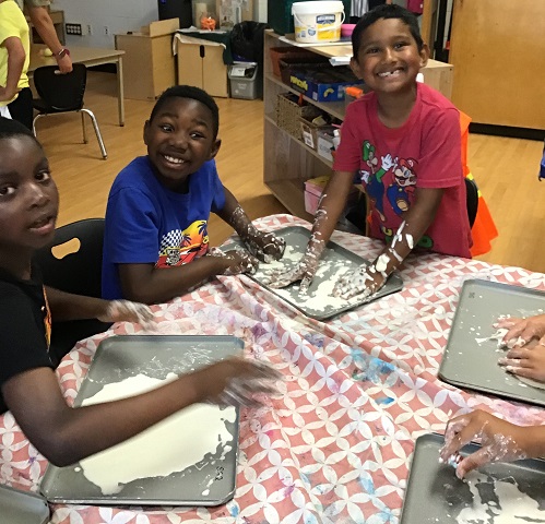 children playing with Oobleck