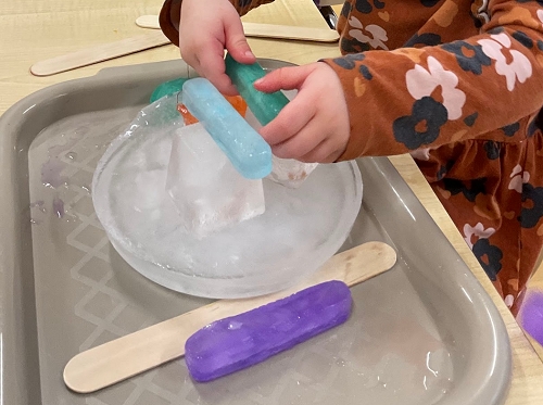 The children explored ice through hands-on experiences that combined colour mixing, sensory discovery, and construction. As they painted and manipulated ice blocks, they observed cause and effect, changes in temperature, and melting, while experimenting with building using different shapes and materials. This exploration supported curiosity, problem-solving, and early scientific thinking through play.