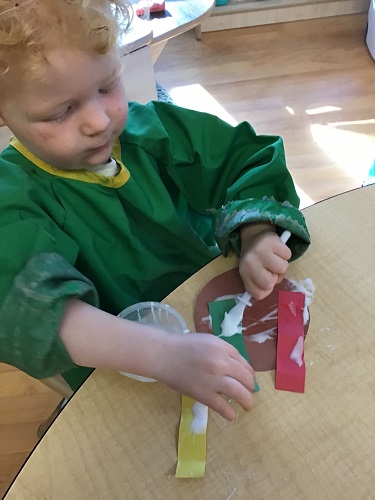 Dean spreading the glue on the turkey