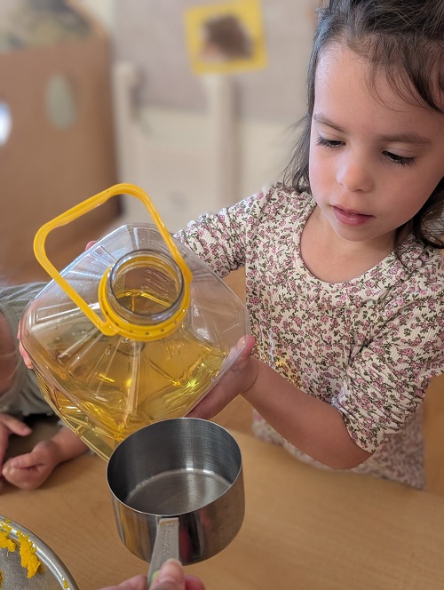 dumping in the oil for the ingredients