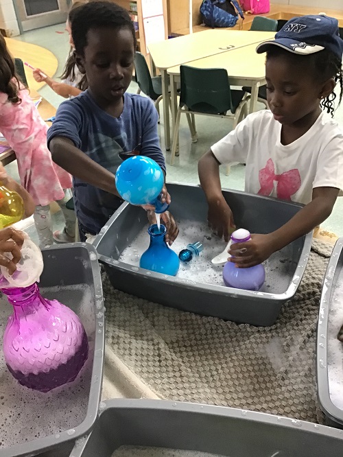 Children engaged in water play. 