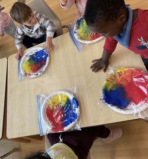 small group mixing paint colours